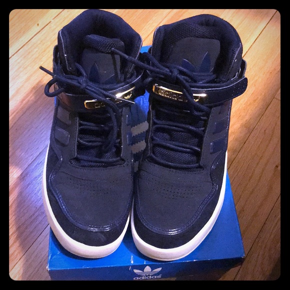 navy blue adidas high tops